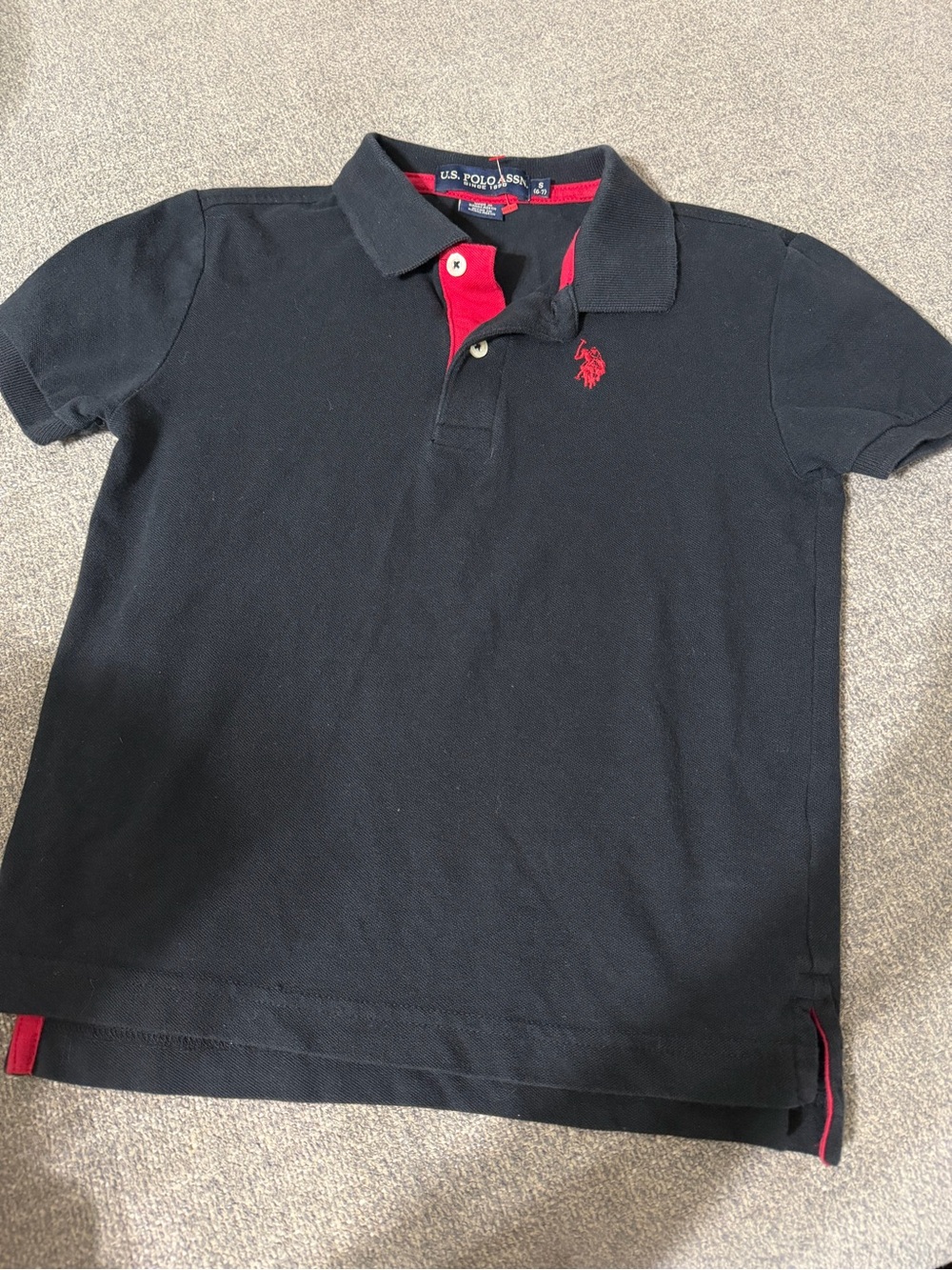 U.S. Polo Assn. Black Polo with Red Contrast Trim